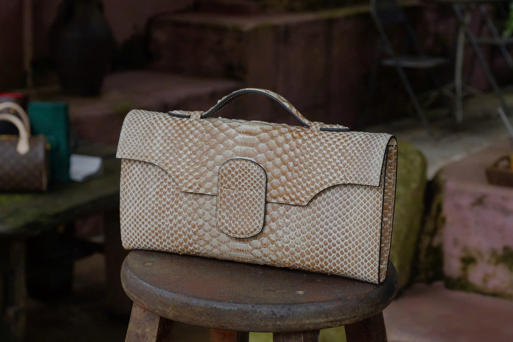 TÚI XÁCH CẦM TAY DA TRĂN VDCT99